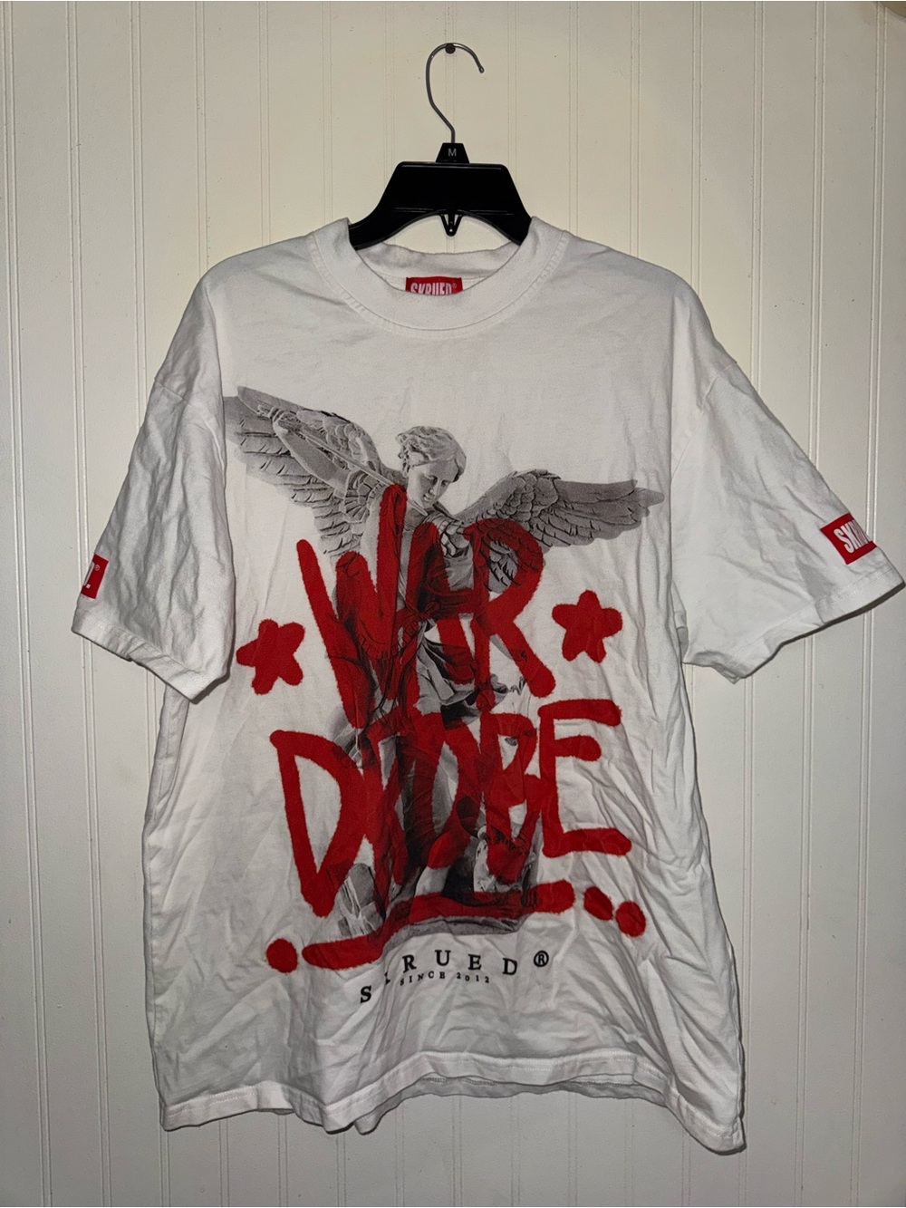 White Short-Sleeve Graphic Tee with Red Script and Angel Motif